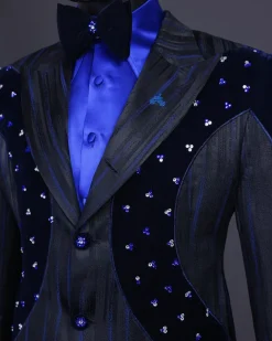 A “Prodigal” lashed midnight blue, admiral blue and splashed black metallic jacquard trench suit