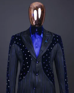 A “Prodigal” lashed midnight blue, admiral blue and splashed black metallic jacquard trench suit