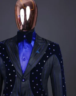 A “Prodigal” lashed midnight blue, admiral blue and splashed black metallic jacquard trench suit