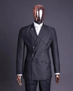 A “quad” charcoal black, 8 button, knitted,Peak lapel “4” breasted suit