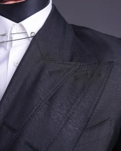 A “quad” charcoal black, 8 button, knitted,Peak lapel “4” breasted suit