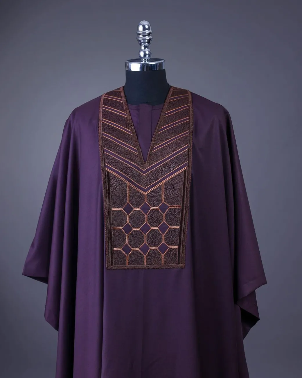 A Rasin purple, layered octagon embroidery detailing Agbada