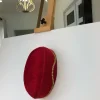 A Red and gold lines ceremonial African Traditional hat