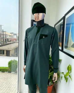A reloaded British racing green, Monochrome embroidery with soaked Italian velvet detailing long sleeve Kaftan and sokoto
