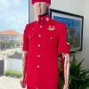 A reloaded Candy red, “veteran” vintage “Havana” French safari suit