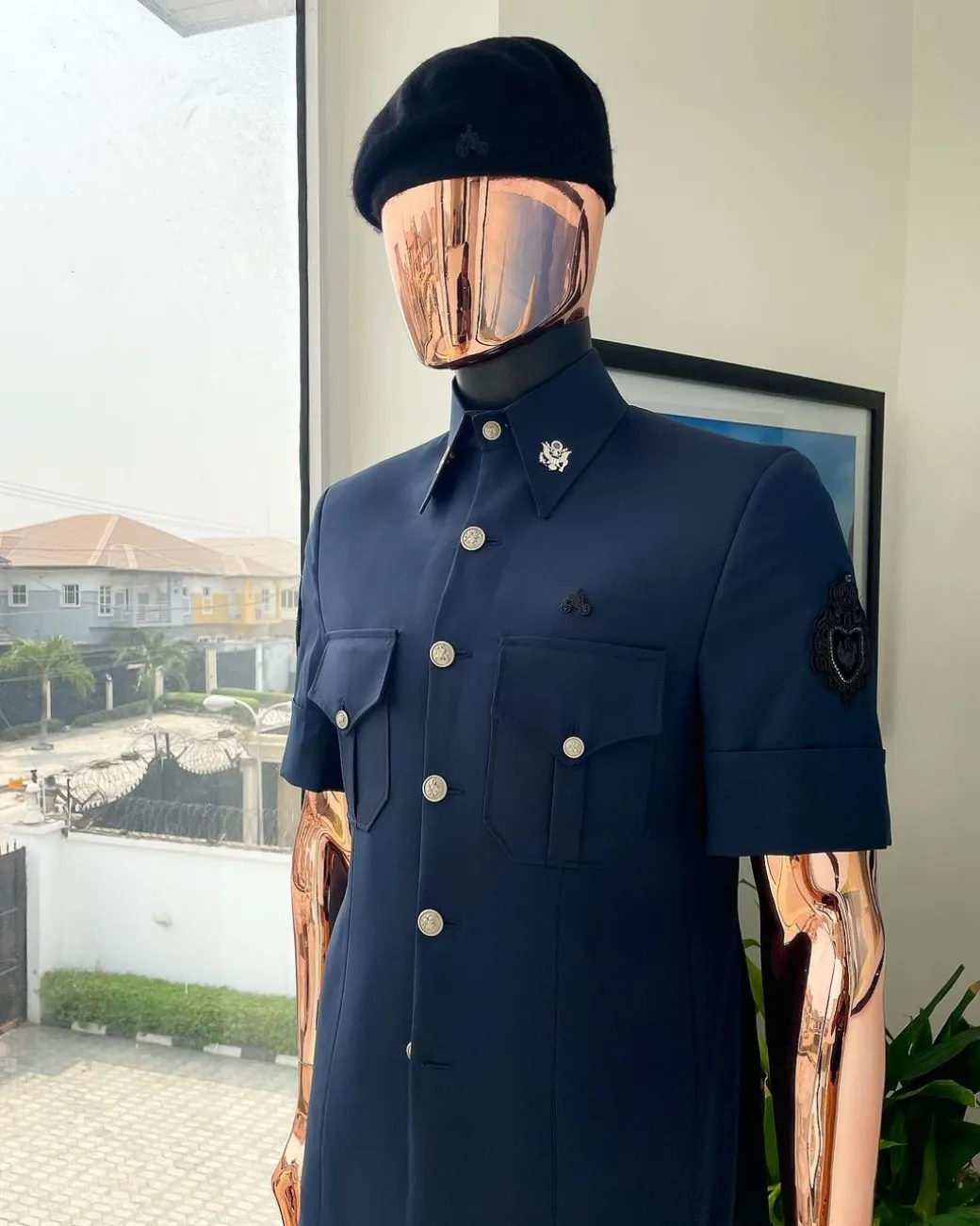 A reloaded Dark Aegean blue vintage “Havana” French safari suit