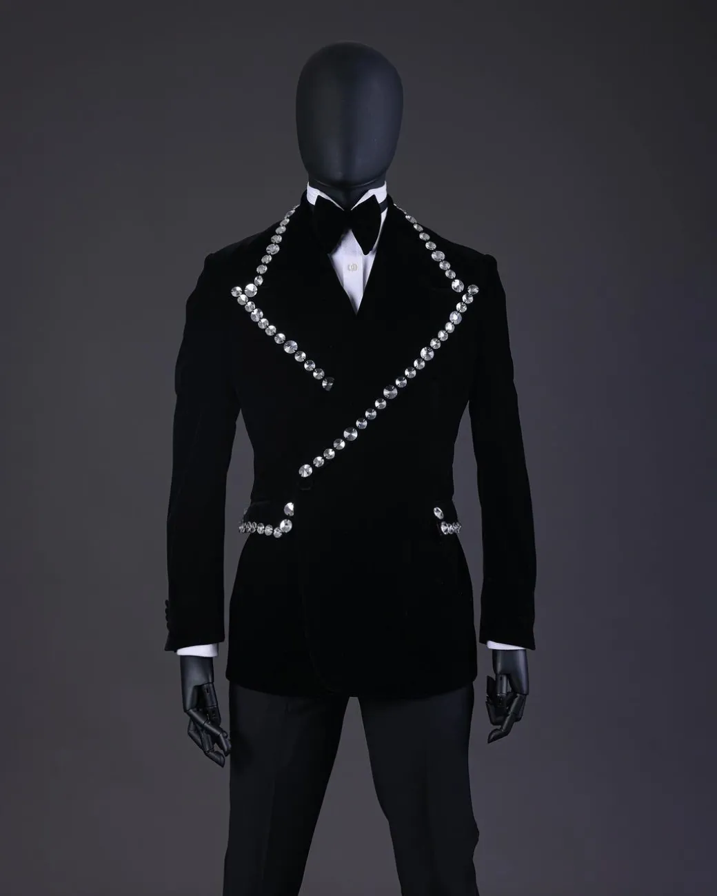 A Reloaded “Herd” Charcoal Black Soaked Velvet Peak Lapel Wrap Tuxedo Suit