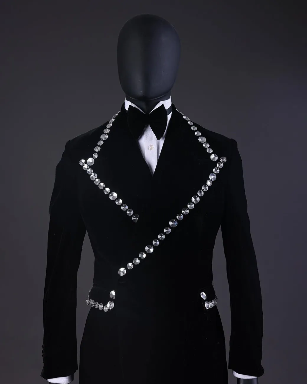 A Reloaded “Herd” Charcoal Black Soaked Velvet Peak Lapel Wrap Tuxedo Suit