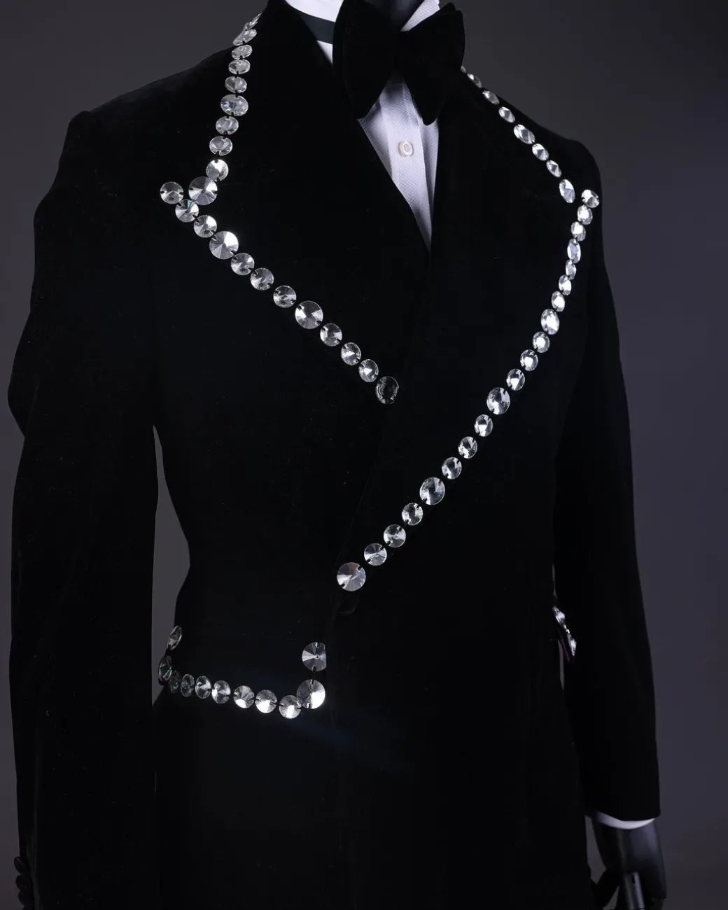 A Reloaded “Herd” Charcoal Black Soaked Velvet Peak Lapel Wrap Tuxedo Suit
