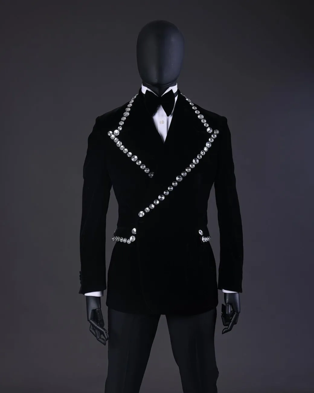 A Reloaded “Herd” Charcoal Black Soaked Velvet Peak Lapel Wrap Tuxedo Suit