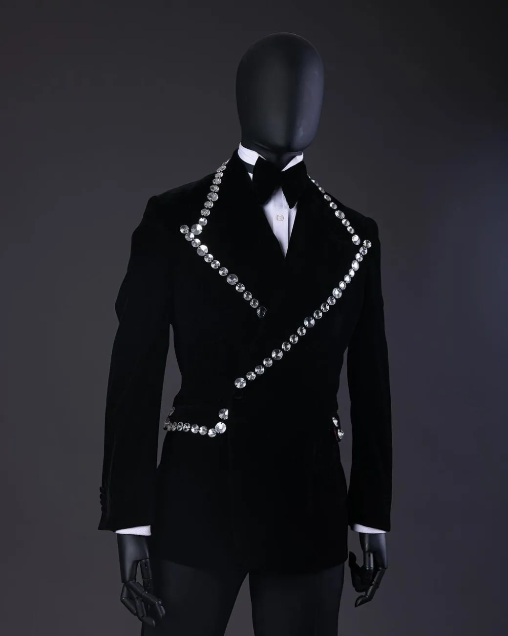 A Reloaded “Herd” Charcoal Black Soaked Velvet Peak Lapel Wrap Tuxedo Suit