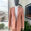 A Reloaded Mauve peak lapel business suit