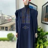 A reloaded midnight blue, connected square embroidery design with matching gold and red Swarovski stone details agbada