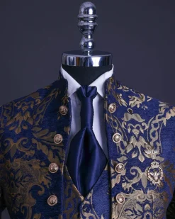 A reloaded “Monaco” gold and blue “Mandarin” jacquard floral single button front cut layered suit