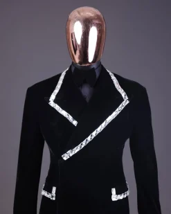 A reloaded monochrome “herd” charcoal black soaked velvet peak lapel wrap tuxedo suit