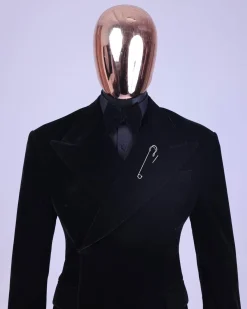 A reloaded monochrome “herd” charcoal black soaked velvet peak lapel wrap tuxedo suit