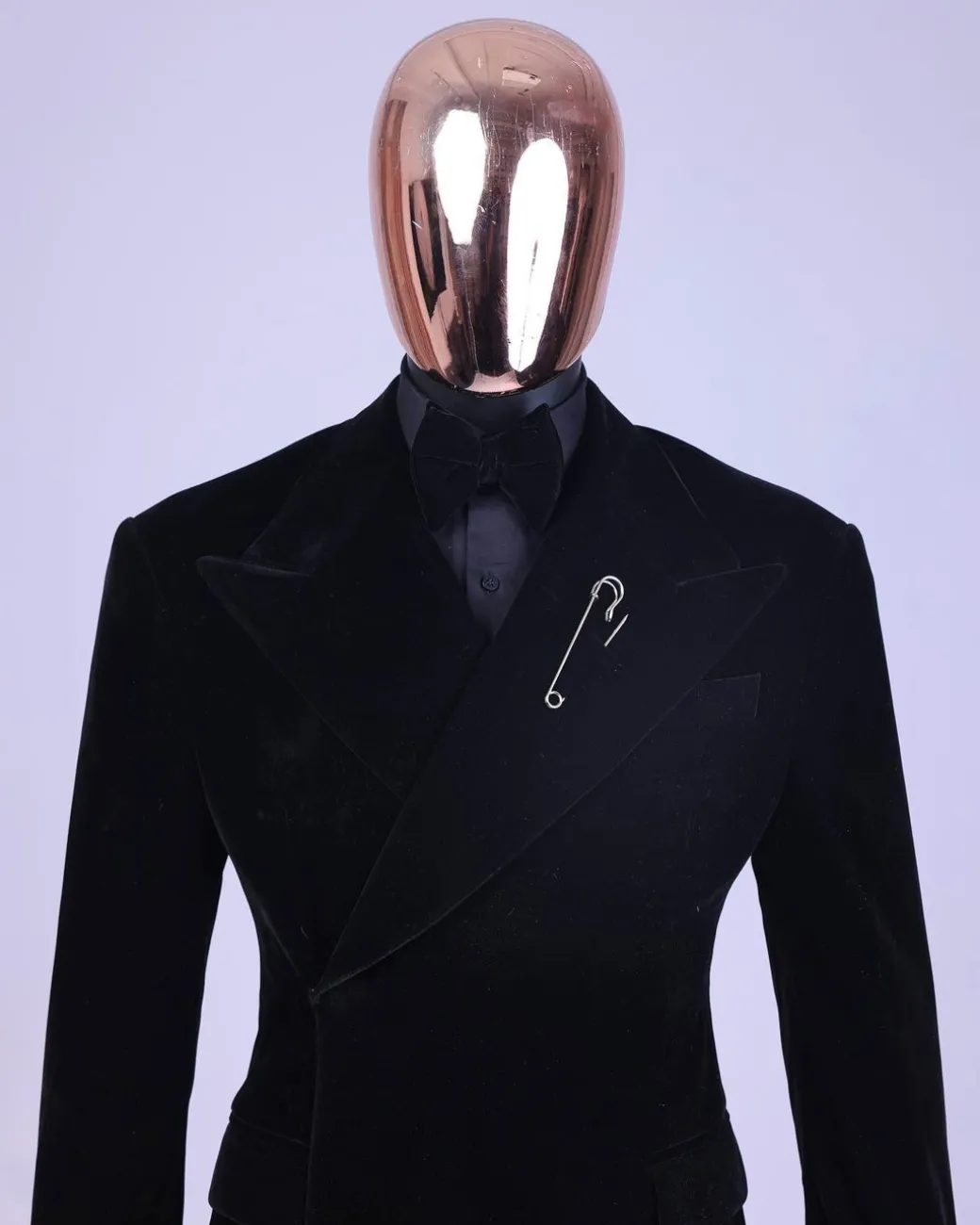 A reloaded monochrome “herd” charcoal black soaked velvet peak lapel wrap tuxedo suit