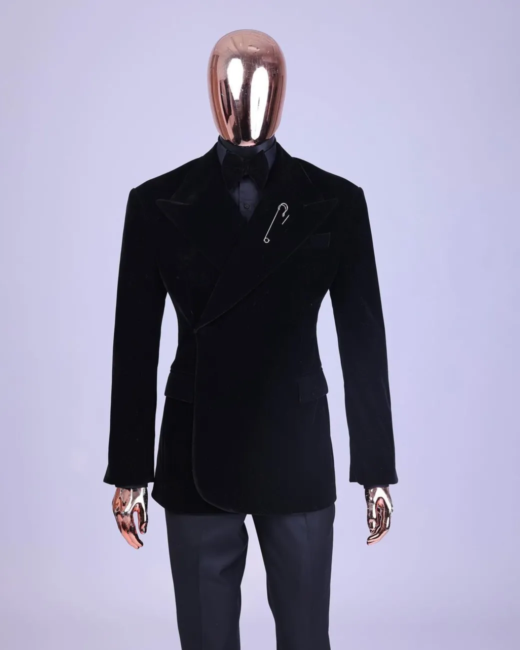 A reloaded monochrome “herd” charcoal black soaked velvet peak lapel wrap tuxedo suit