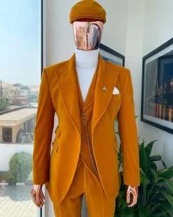 A reloaded monochrome “peaky blinders” hand knitted soaked Italian velvet ochre yellow peak lapel suit