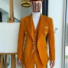 A reloaded monochrome “peaky blinders” hand knitted soaked Italian velvet ochre yellow peak lapel suit