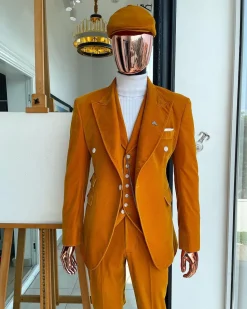 A reloaded monochrome “peaky blinders” hand knitted soaked Italian velvet ochre yellow peak lapel suit