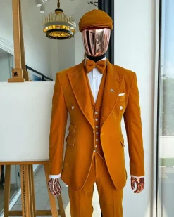 A reloaded monochrome “peaky blinders” hand knitted soaked Italian velvet ochre yellow peak lapel suit