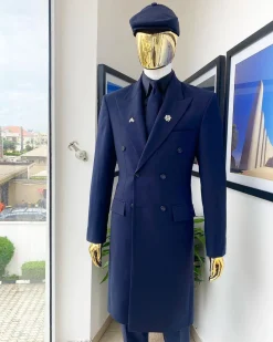 A reloaded monochrome “peaky Blinder” midnight blue peak lapel trench suit