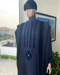 A Reloaded navy blue Monochrome embrodery with soaked Italian velvet detailing agbada
