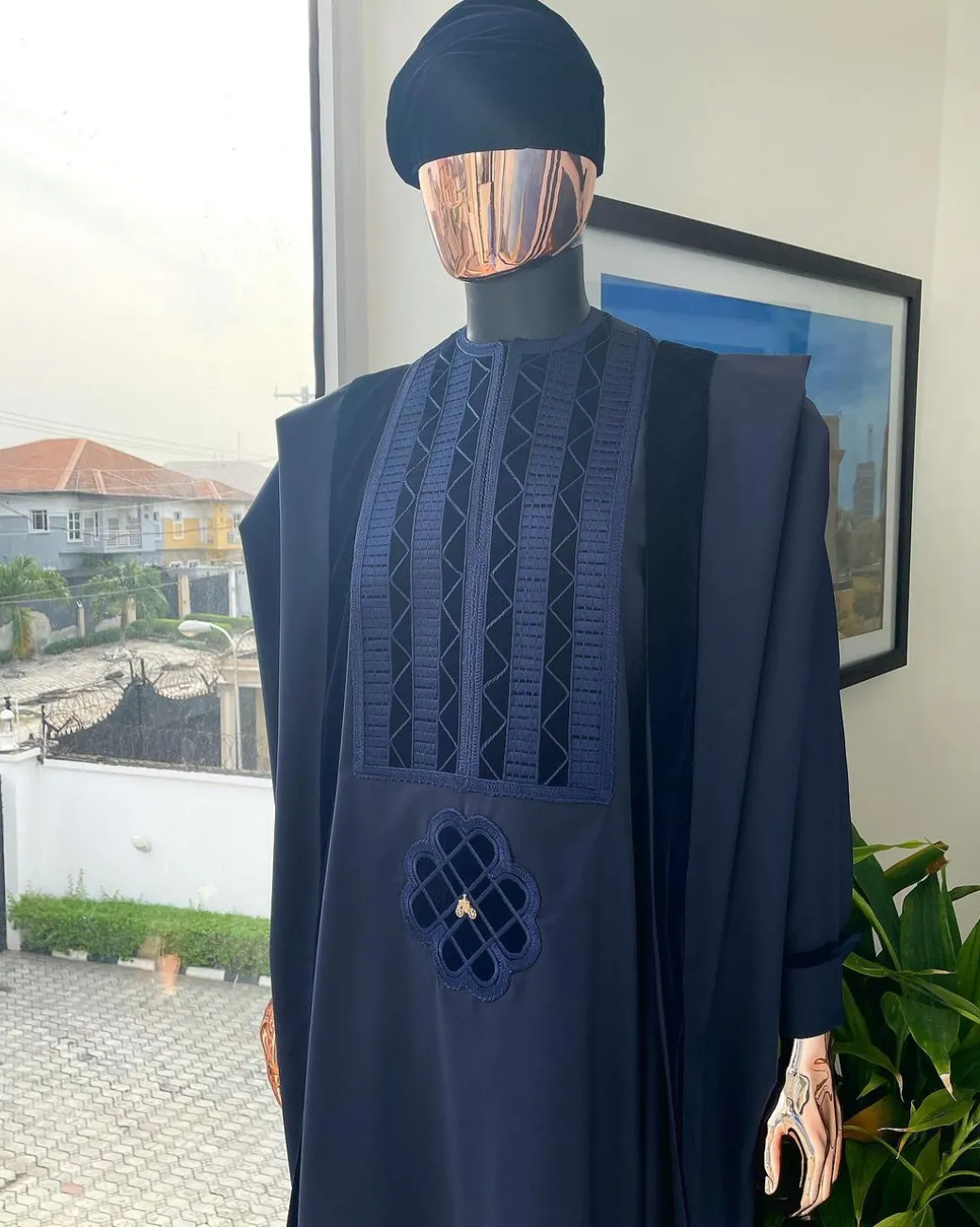 A Reloaded navy blue Monochrome embrodery with soaked Italian velvet detailing agbada