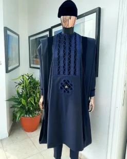 A Reloaded navy blue Monochrome embrodery with soaked Italian velvet detailing agbada