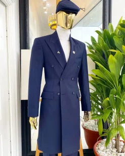 A reloaded “peaky Blinder” midnight blue peak lapel trench suit