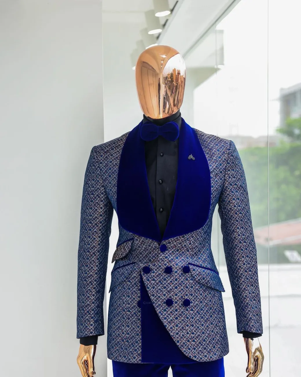 A Reloaded “pirate”, spotted navy blue and orange metallic jacquard, shawl lapel tuxedo suit