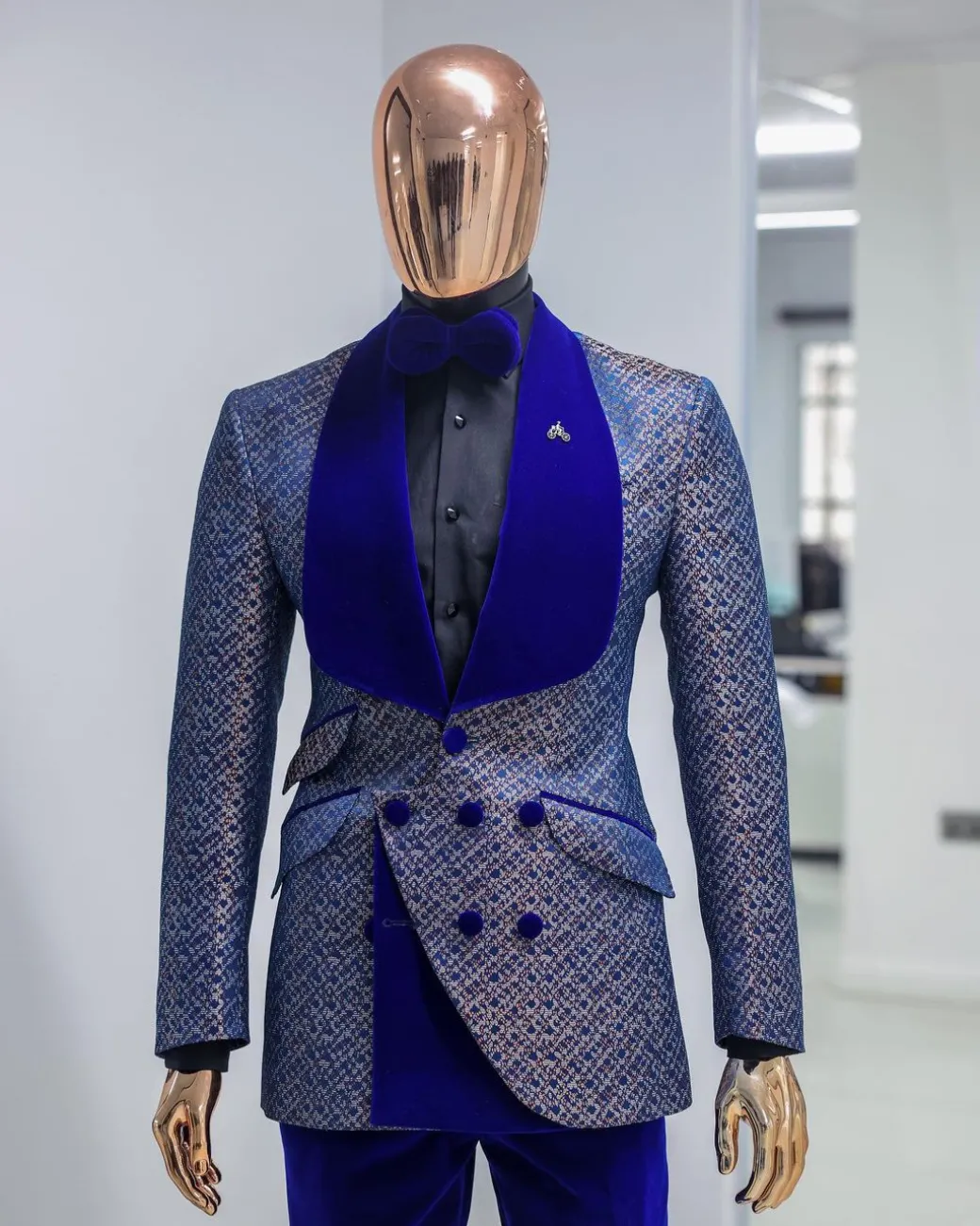 A Reloaded “pirate”, spotted navy blue and orange metallic jacquard, shawl lapel tuxedo suit
