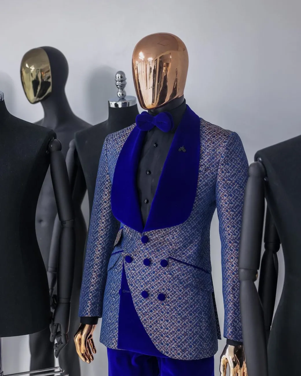A Reloaded “pirate”, spotted navy blue and orange metallic jacquard, shawl lapel tuxedo suit