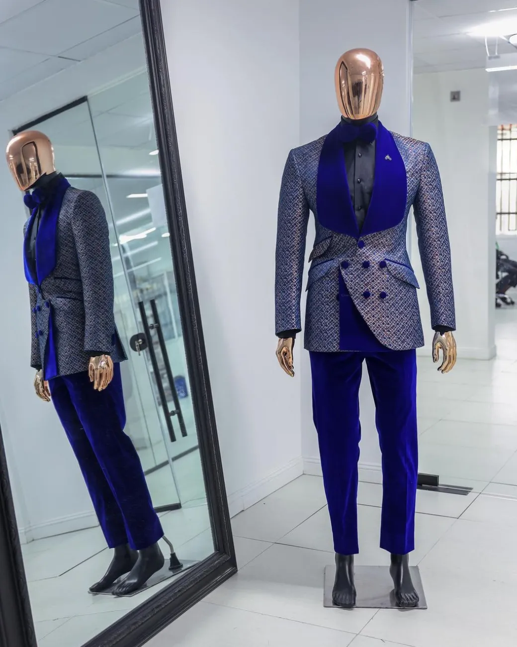 A Reloaded “pirate”, spotted navy blue and orange metallic jacquard, shawl lapel tuxedo suit