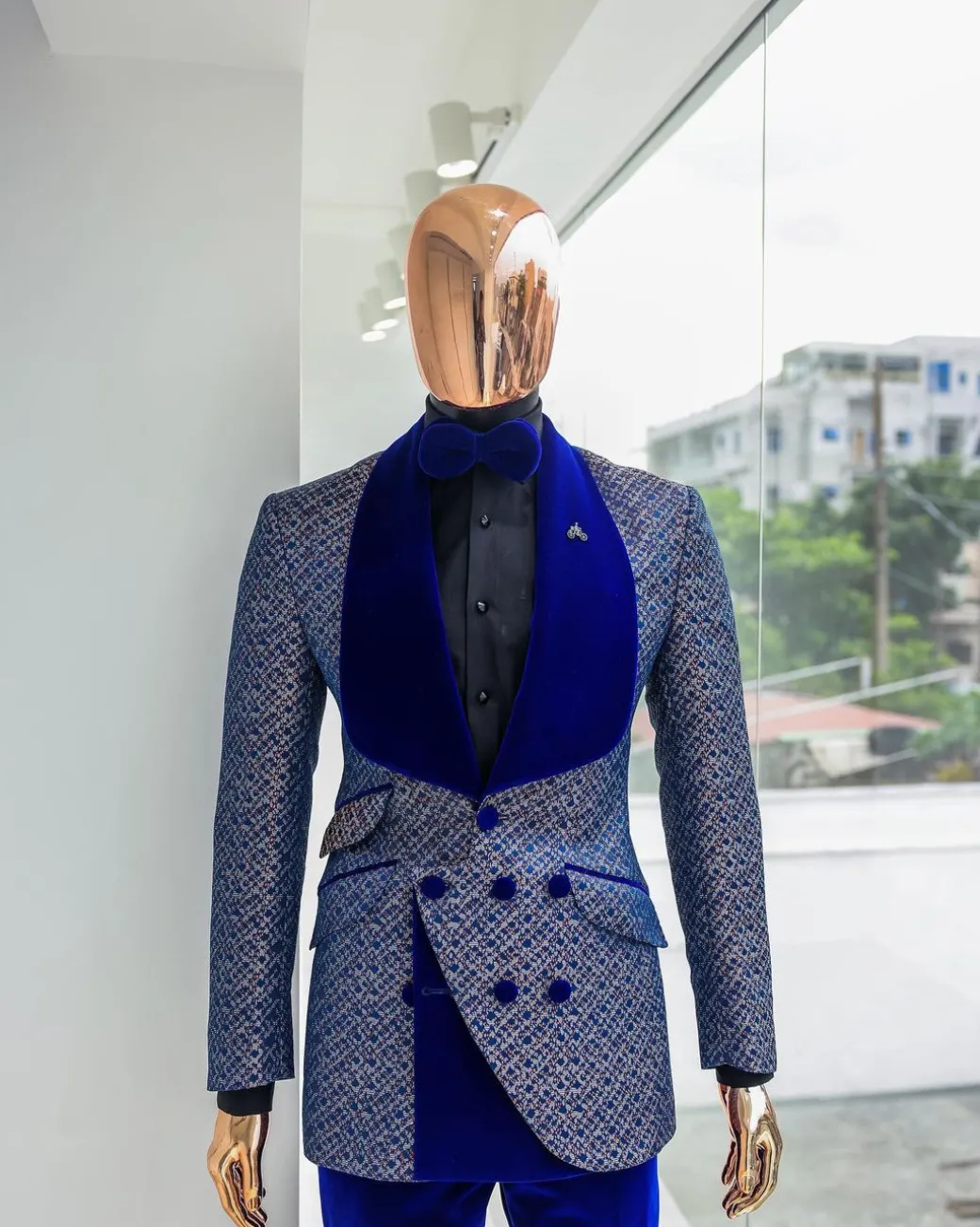 A Reloaded “pirate”, spotted navy blue and orange metallic jacquard, shawl lapel tuxedo suit