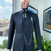 A Reloaded “Pope” monochrome charcoal black single button bishop neck suit