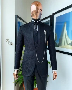 A Reloaded “Pope” monochrome charcoal black single button bishop neck suit