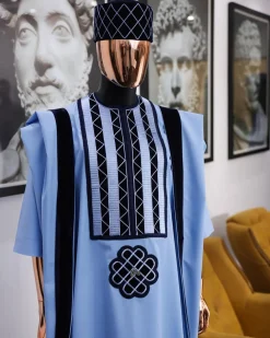 A Reloaded sky blue Monochrome embroidery with navy blue soaked Italian velvet detailing agbada