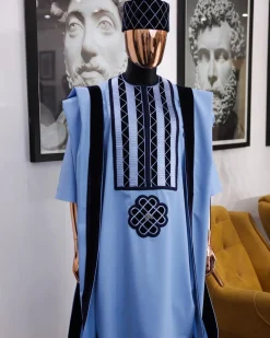 A Reloaded sky blue Monochrome embroidery with navy blue soaked Italian velvet detailing agbada