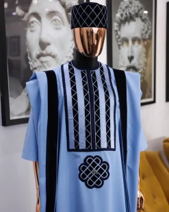 A Reloaded sky blue Monochrome embroidery with navy blue soaked Italian velvet detailing agbada