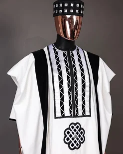 A Reloaded white Monochrome embroidery with charcoal black soaked Italian velvet detailing agbada