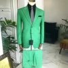 A “Rich Green” peak lapel, “hand knitted” patch pocket Suit