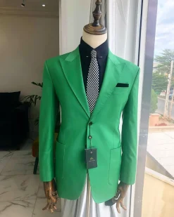 A “Rich Green” peak lapel, “hand knitted” patch pocket Suit