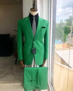 A “Rich Green” peak lapel, “hand knitted” patch pocket Suit