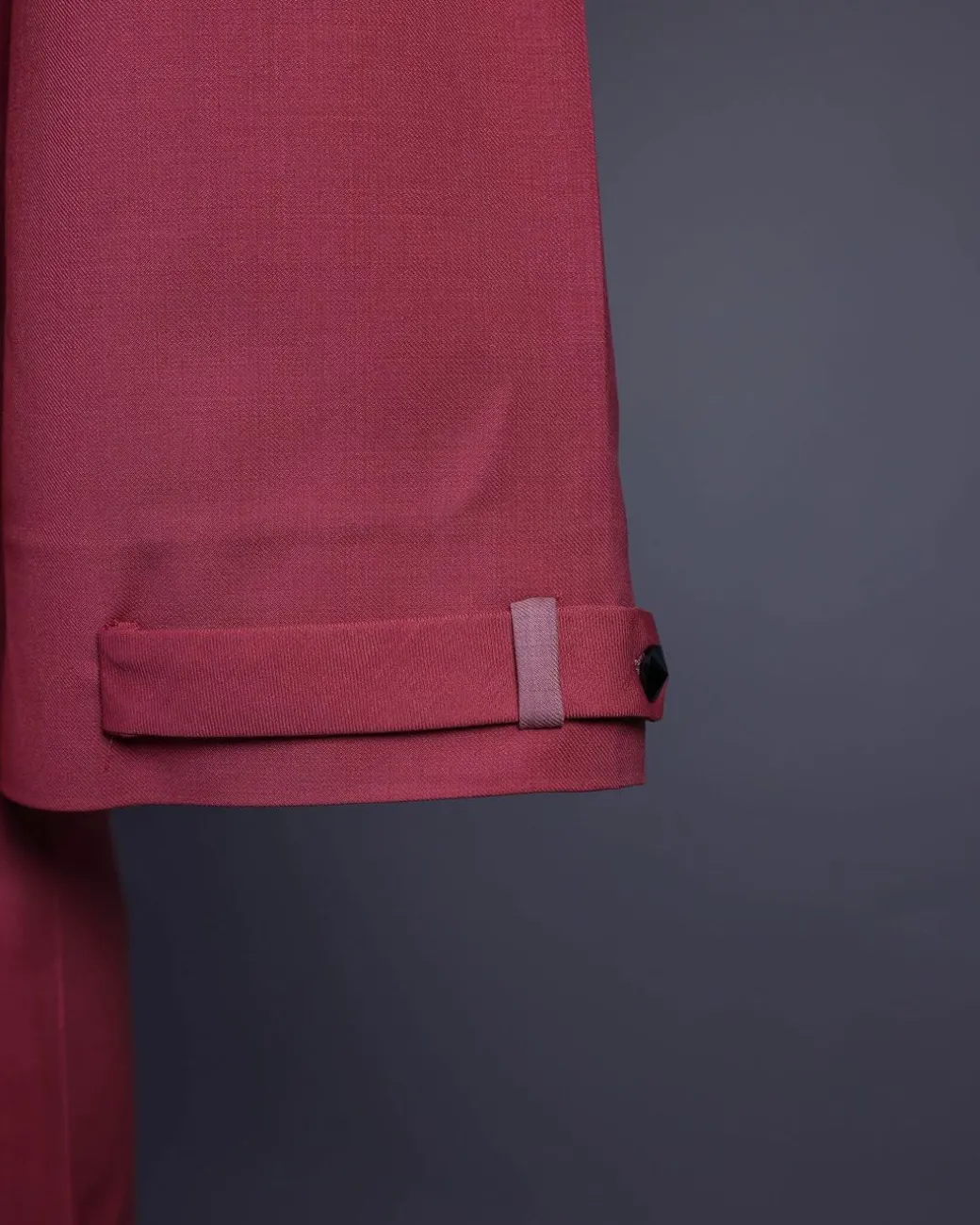 A Rogue pink, Front flap with black Swarovski button, 3/4 sleeve with combat patch pocket details African senator kaftan native.