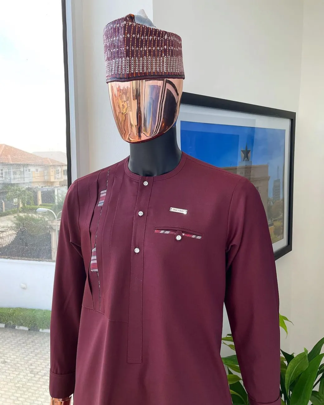 A Rosewood red, layered left section details with matching paisley, flap with Swarovski button, and combat pocket African traditional senator kaftan native