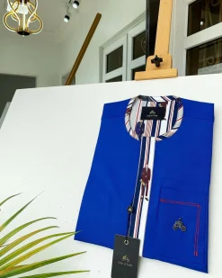 A Royal blue African kaftan with walk to grade silk lining detailing and sokoto
