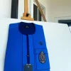 A Royal blue with navy blue mix, hand embroidery patch detailing, and black butterfly metal lapel African Kaftan