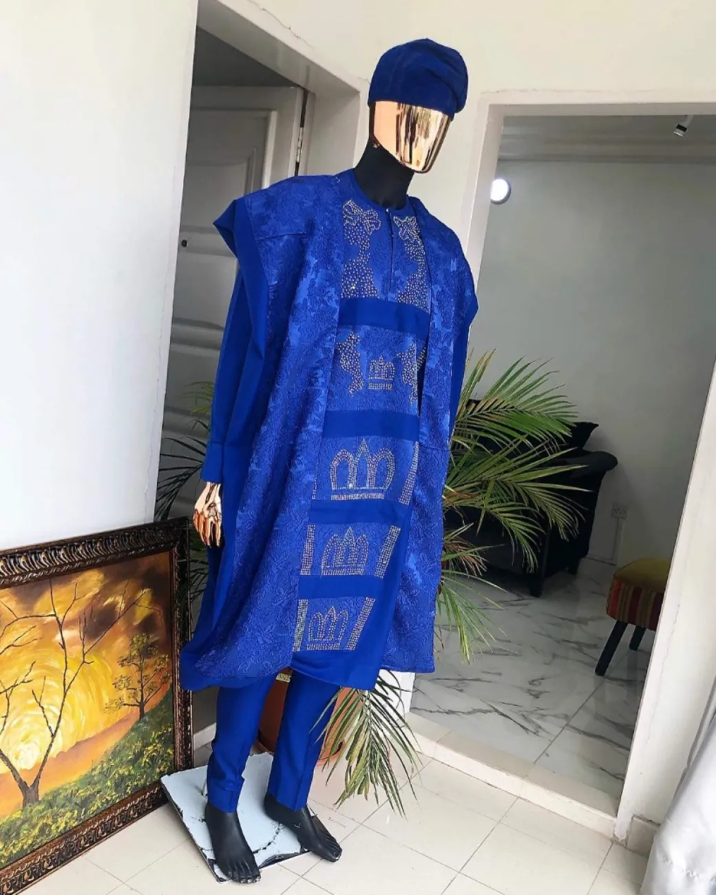 A Royal blue with swarovski on jacquard detailing matching hand wooven embroidery agbada